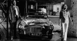 Michael Caine and an Aston Martin DB4 in 'The Italian Job' (1969). Michael Caine and an Aston Martin DB4 in 'The Italian Job' (1969).