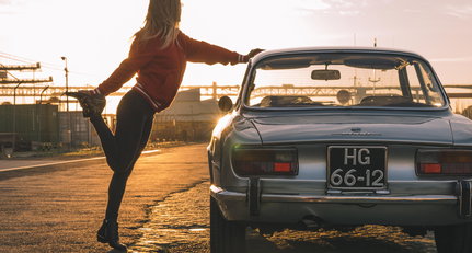 A morning stretch with Andra and an alluring Alfa Romeo GTV