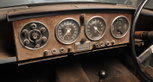 Aston Martin DB2/4 DHC, sold by Bonhams in 2012 for £113,500 Aston Martin DB2/4 DHC, sold by Bonhams in 2012 for £113,500