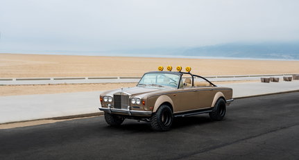 Is it just us, or is this chopped up and lifted Rolls-Royce the perfect beach machine?