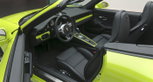 Acid-green interior of a 2013 Porsche 911 Carrera S 3,8 "60 Jahre Porsche Clubs". Acid-green interior of a 2013 Porsche 911 Carrera S 3,8 "60 Jahre Porsche Clubs".
