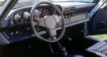 A 1978 Porsche 911 Turbo 3,3 Coupé with 'checkered flag' seats. A 1978 Porsche 911 Turbo 3,3 Coupé with 'checkered flag' seats.