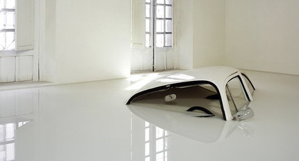 Automotive milk bath: The sinking Beetle of Ivan Puig
