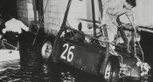 Ascari's Lancia is retrieved from the harbour waters in the aftermath of the 1955 Monaco GP
