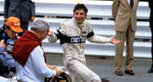 A confused Patrese learns of his win at an unbelievable Monaco GP in 1982