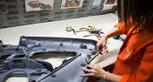 Preparing a Ferrari door at Poltrona Frau factory. Preparing a Ferrari door at Poltrona Frau factory.