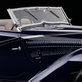 Upswept curve at the center base of the folding windshield