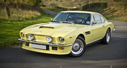 1977 Aston Martin V8 yellow.jpg