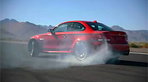 Video: Im BMW 1er M Coupé durch die Wand Video: Im BMW 1er M Coupé durch die Wand