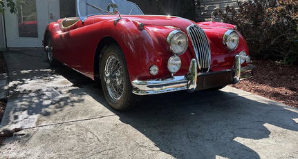 1956 Jaguar XK 140 09e3cd7c4433dca11f7f23b132e73f62.jpeg