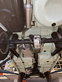 The underside of a car on a lift / Unterboden des Autos von auf einer Hebebühne